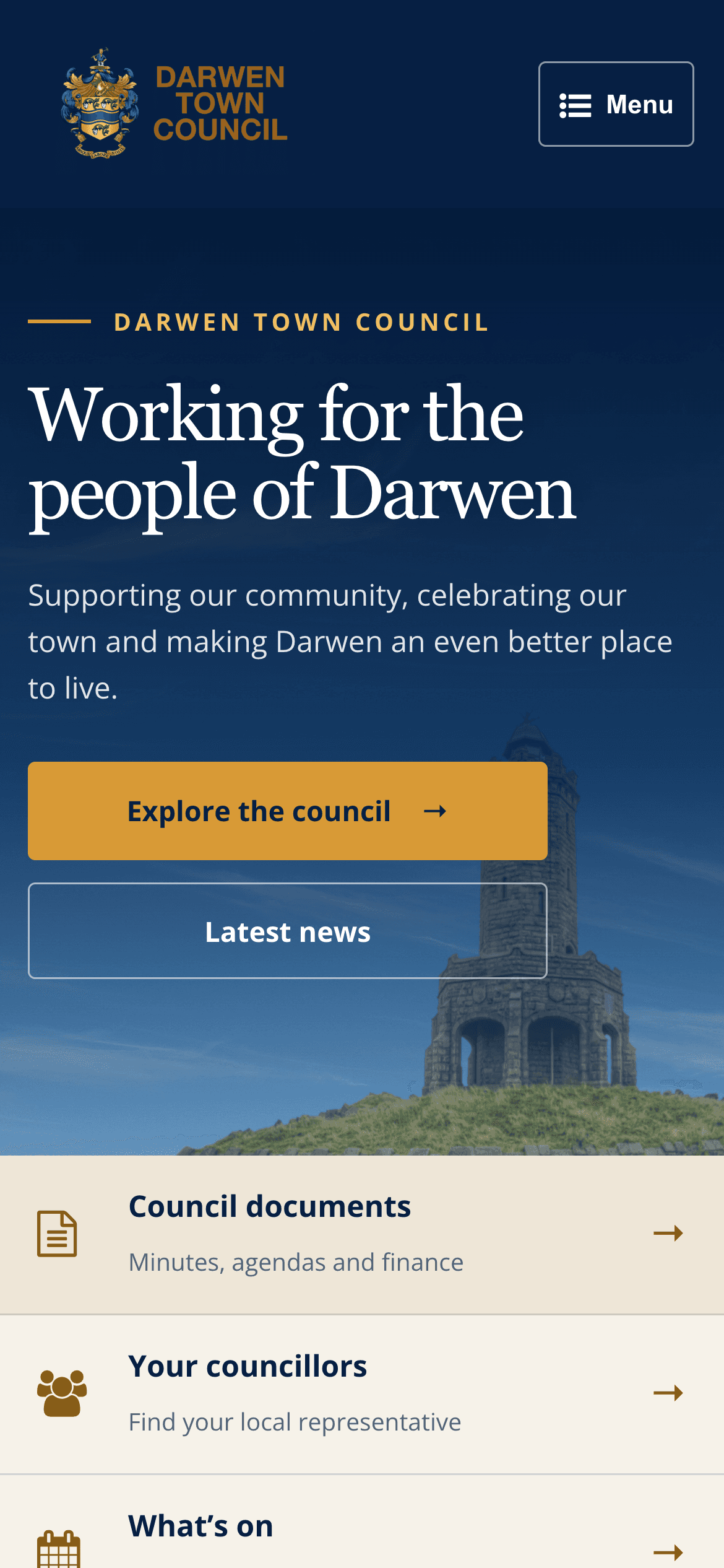 Darwen Town Council homepage on a phone: the gold council crest, a Menu button, Jubilee Tower, and the heading Working for the people of Darwen.